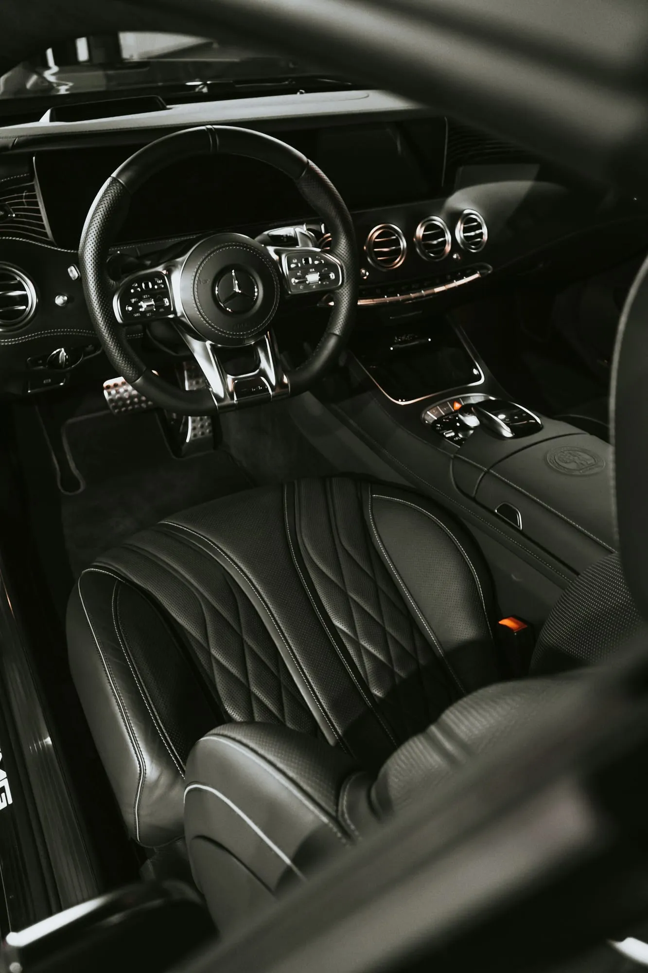 Black quilted leather seats after cleaning